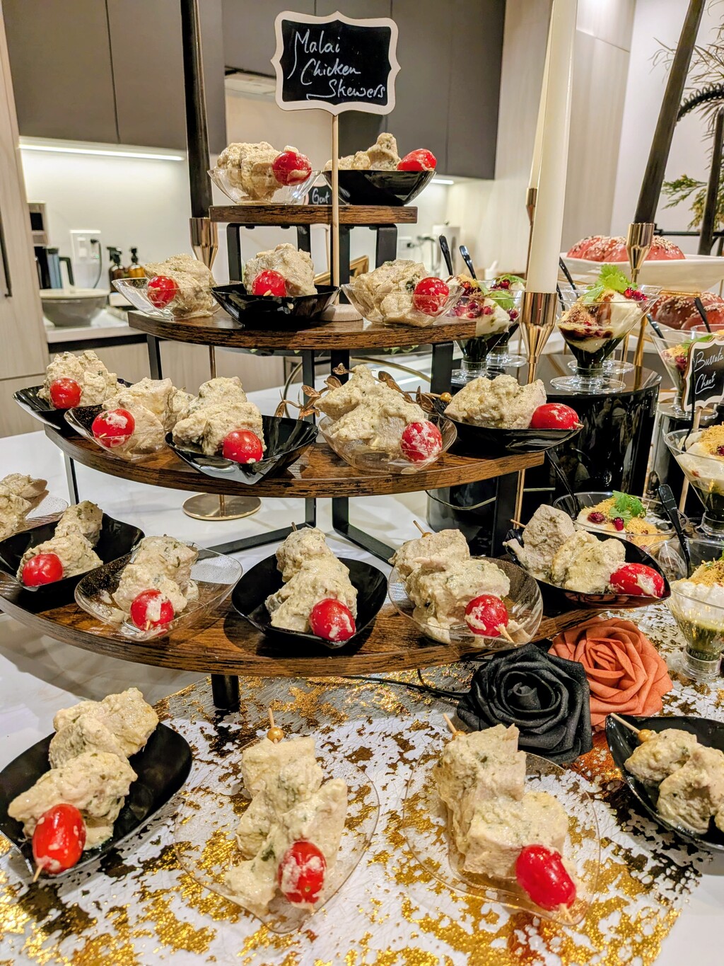 Elevated grazing display with risers and height variation